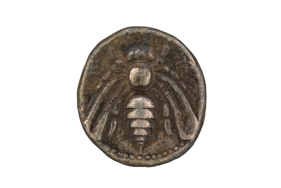 Coin w. bee imprinted